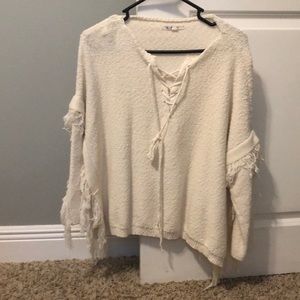 Blush Noir boutique poncho sweater